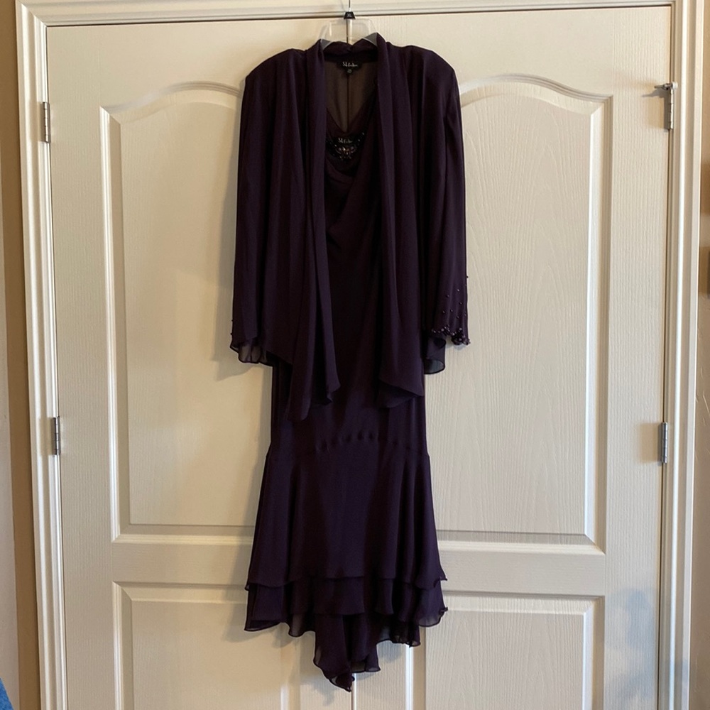 Beautiful evening dress with sheer cover. Beads neckline, sleeves. Hemline taper
